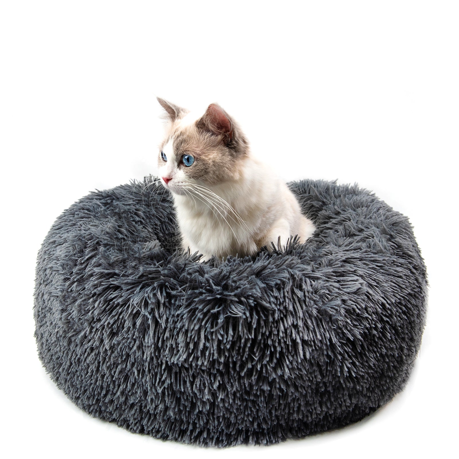 "Ultra-soft, fluffy pet bed designed for deep sleep and relaxation. Features a plush, round donut shape with cozy faux fur for warmth and comfort. Ideal for cats and small dogs to curl up and enjoy a restful sleep."